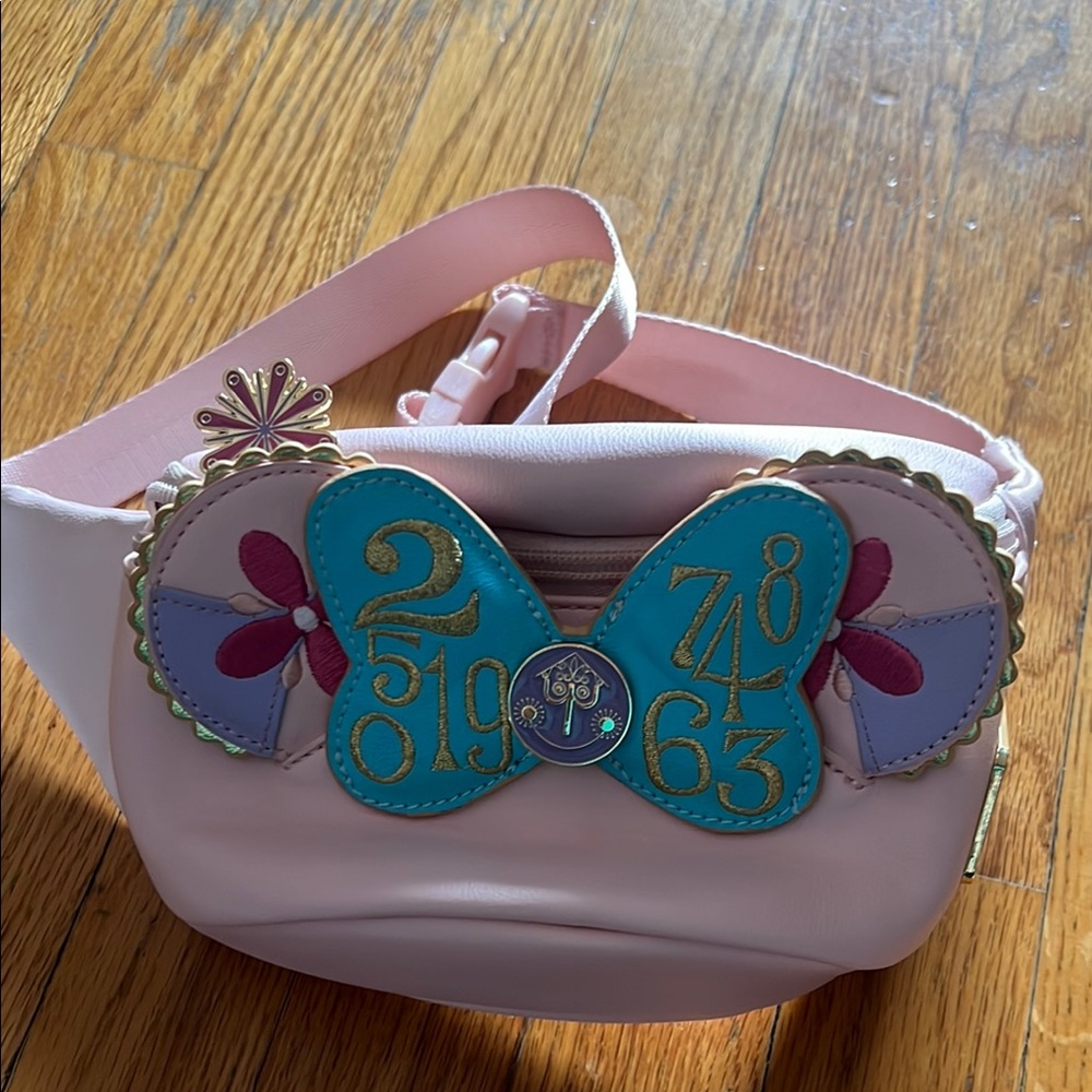 Loungefly Pink and Blue Crossbody Bag with Playful Charm